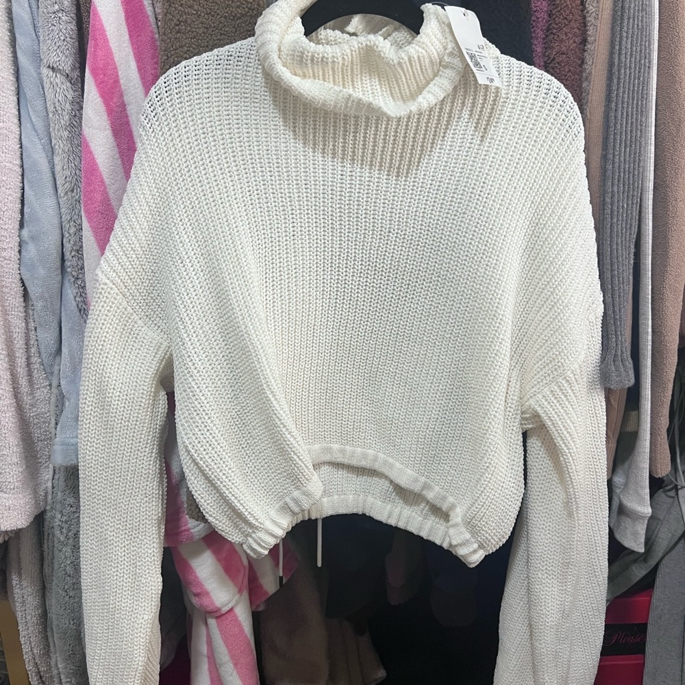 White turtle neck top
